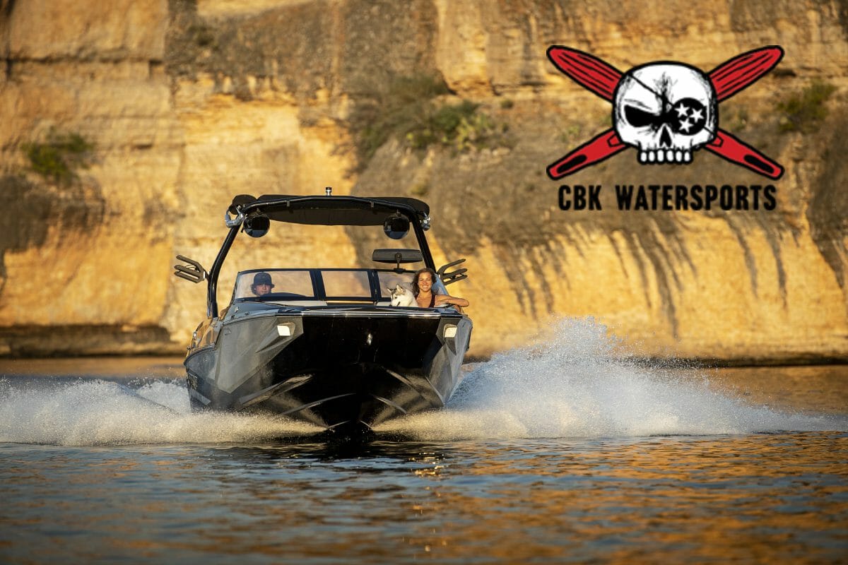 A Supreme boat with a skull and crossbones in the water.