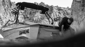 Fitting wake board boot on back of the boat