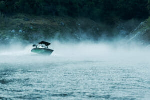 Supreme S240 boat in the steaming water