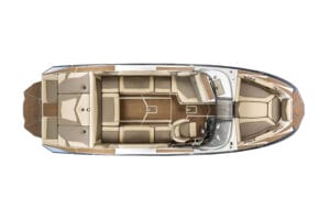 Overhead view of a Supreme S240 motorboat with tan and brown cushioned seating, a central cockpit with steering controls, and open deck space at the front and rear.