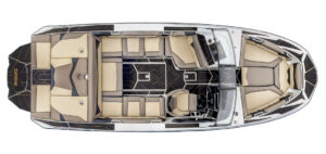 Top view of a modern Supreme S220 boat with tan and black seating, a central walk-through area, and a driver’s console on the right side.
