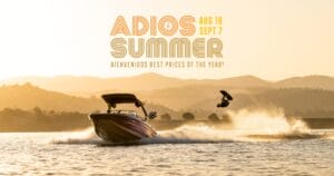 A person wakeboarding behind a speedboat on a lake at sunset, with bold text promoting Cal State Wake end-of-summer deals and summer savings—don't miss out on sale dates!.